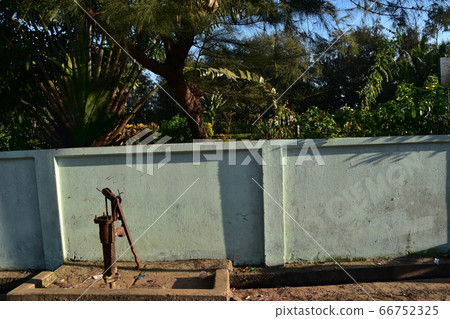 Cooperative well installed at Cox's Bazar beach in Bangladesh Retro hand pump Cooperative well installed at Cox's Bazar beach in Bangladesh Retro hand pump 66752325