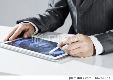 Internet security concept with woman working on media screen with stylus Internet security concept with woman working on media screen with stylus 66761263
