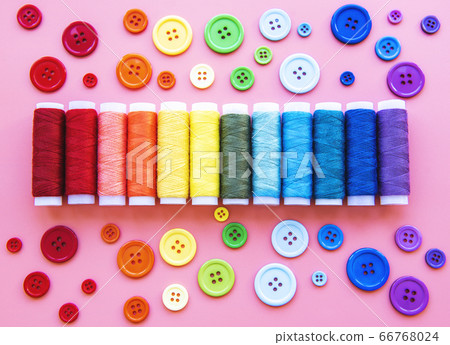 Spools of thread and buttons on the colors of the 66768024
