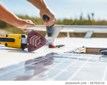 RV solar panel installation. Caravan roof repair 66768510