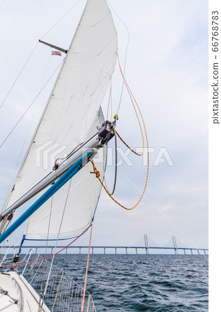 Yacht and oresund bridge between denmark sweden Yacht and oresund bridge between denmark sweden 66768783