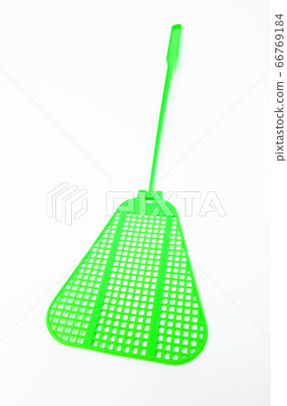 green fly swatter on white background 66769184