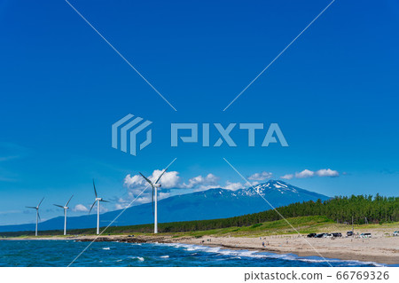 Wind power generation and Mt. Chokai beside Miyami beach, Sakata City, Yamagata Prefecture Wind power generation and Mt. Chokai beside Miyami beach, Sakata City, Yamagata Prefecture 66769326