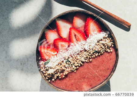 Strawberry Smoothie in Coconut Bowl Strawberry Smoothie in Coconut Bowl 66770839