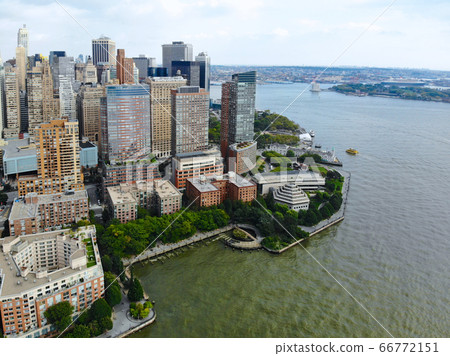 Aerial view of Manhattan skyline with Battery Park, New York, USA. Aerial view of Manhattan skyline with Battery Park, New York, USA. 66772151
