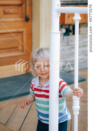 Cute little happy blond child Cute little happy blond child 66773876