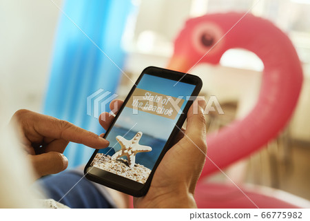 man and text state of the beaches in a smartphone man and text state of the beaches in a smartphone 66775982