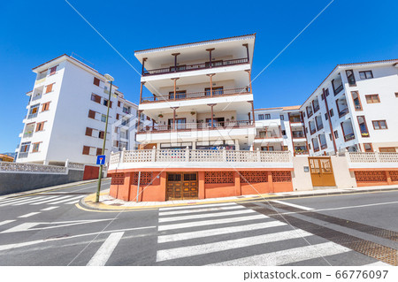 Street with white buildings in Candelaria Tenerife 66776097