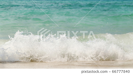 Wave of the sea swashing up onto sand beach, Wave of the sea swashing up onto sand beach, 66777840