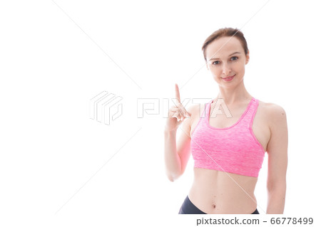 Young woman wearing sportswear to do abyss Young woman wearing sportswear to do abyss 66778499
