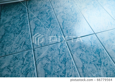 Tiled bathroom floor 66779564