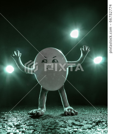 An egg surrendering, with torches in the background An egg surrendering, with torches in the background 66782774