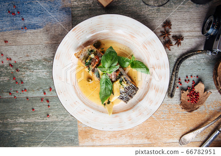 Appetizing gourmet salmon steak with creamy sauce Appetizing gourmet salmon steak with creamy sauce 66782951