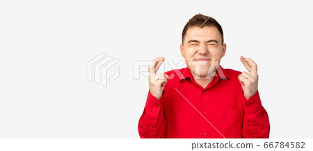 good luck gesture excited man crossed fingers 66784582