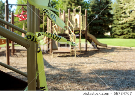 Empty children playground and swing during the coronavirus quarantine Empty children playground and swing during the coronavirus quarantine 66784767
