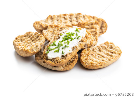 Crispbread with creamy cheese. Crispbread with creamy cheese. 66785208