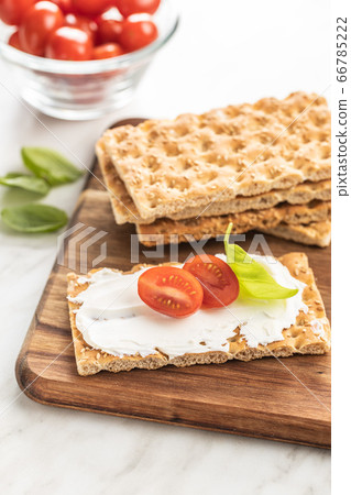 Dieting knackebrot. Crispbread with creamy 66785222