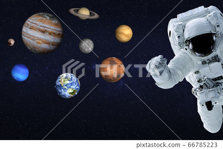 Astronaut near Planets of solar system 66785223