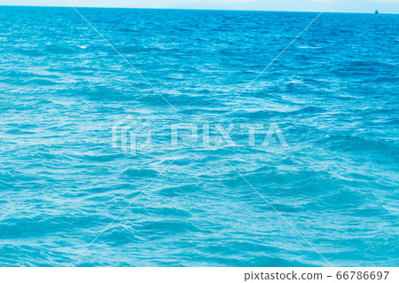 Bright Blue ocean with smooth wave background. Bright Blue ocean with smooth wave background. 66786697
