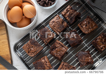 chocolate brownies with ingredients and baking 66790786