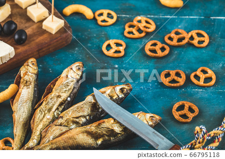 Pretzels with cheese cubes and dry fish Pretzels with cheese cubes and dry fish 66795118