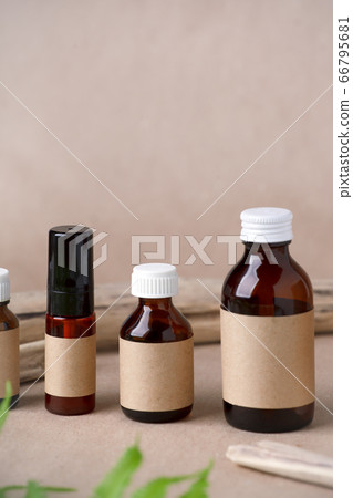 Set of cosmetic dark amber glass bottles with 66795681