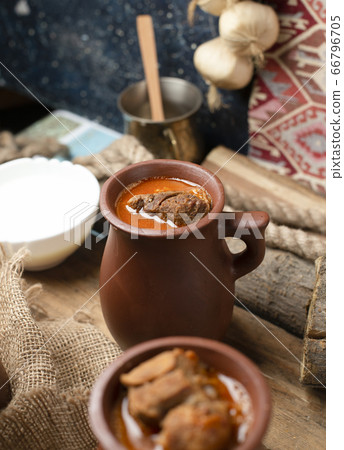 Traditional caucasian piti soup in pots 66796705