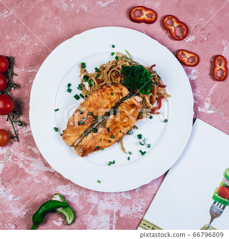 Grilled salmon with herbs and spices in white plate , top view Grilled salmon with herbs and spices in white plate , top view 66796809