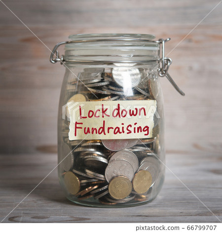 money jar with lockdown fundraising label. money jar with lockdown fundraising label. 66799707