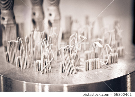 Object printed on metal 3d printer close-up Object printed on metal 3d printer close-up 66800461