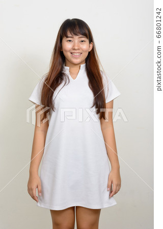 Portrait of happy young Asian woman smiling 66801242