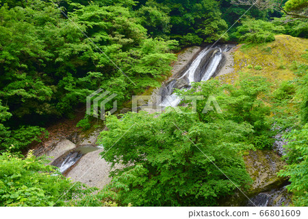 Man and Waterfall Wajima City Man and Waterfall Wajima City 66801609