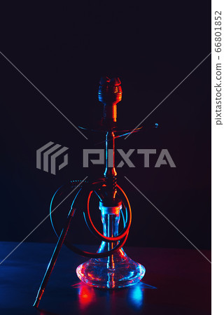 hookah shisha with coals on the table on a black background 66801852