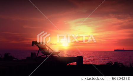 Empty deck chair on a background of orange sunset. Empty deck chair on a background of orange sunset. 66804288