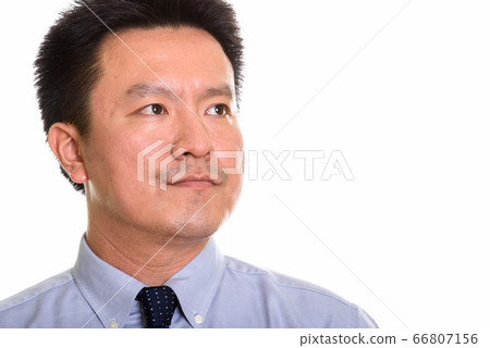 Studio shot of Japanese man isolated against white background Studio shot of Japanese man isolated against white background 66807156