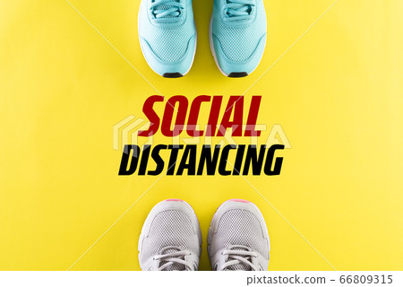 Social Distancing concept. shoes with ruler on 66809315