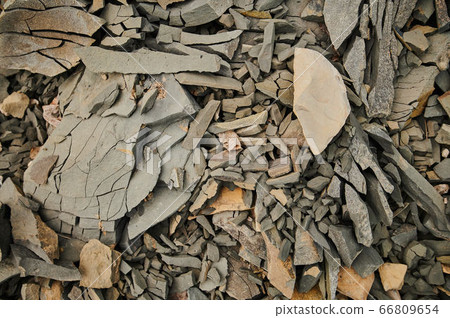 Layers of soil with groundwater. Details of earth layers in a clay pit. Form and colors of soil. Background natural textures. Ground land cross section. Abstract terrain view. Cracked dry rural ground Layers of soil with groundwater. Details of earth layers in a clay pit. Form and colors of soil. Background natural textures. Ground land cross section. Abstract terrain view. Cracked dry rural ground 66809654