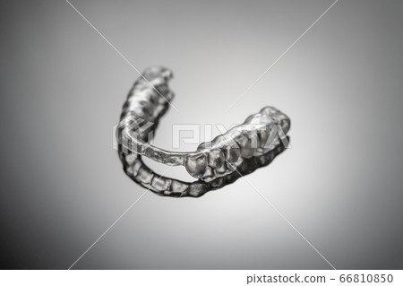 night dental guard by bruxism on gray background night dental guard by bruxism on gray background 66810850