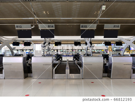 Front view of check-in area in airport Front view of check-in area in airport 66812193