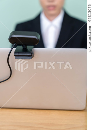 Young woman interviewing online using a webcam Young woman interviewing online using a webcam 66813076