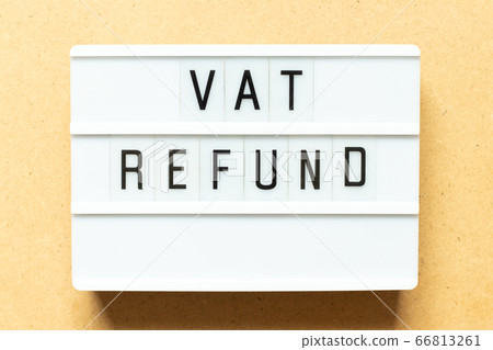 Lightbox with word vat refund on wood background Lightbox with word vat refund on wood background 66813261