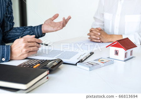 Real estate broker agent being analysis and making 66813694