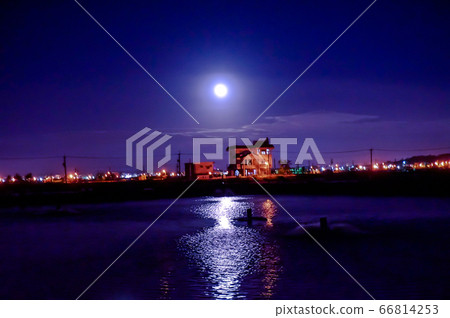 Moonlit night and sea house 66814253