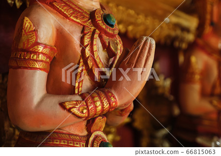 Close-up of hands of a praying sculpture. Close-up of hands of a praying sculpture. 66815063