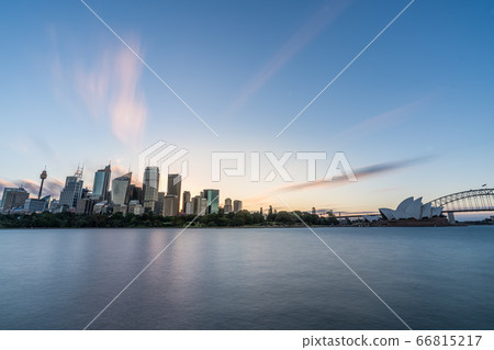 Sydney downtown skyline during sunset at Sydney harbor bay, NSW, Australia Sydney downtown skyline during sunset at Sydney harbor bay, NSW, Australia 66815217