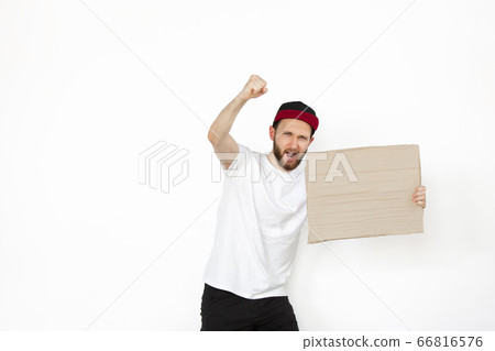 Young man protesting with blank board, sign isolated on white studio background 66816576