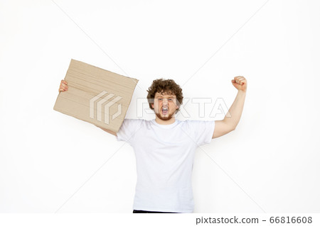 Young man protesting with blank board, sign isolated on white studio background 66816608