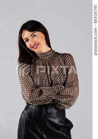 Woman in blouse and culottes on white Woman in blouse and culottes on white 66816795