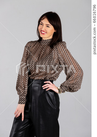Woman in blouse and culottes on white 66816796