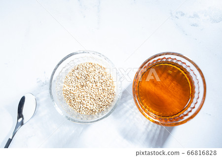 Sesame oil and sesame. Edible and beauty oil. 66816828